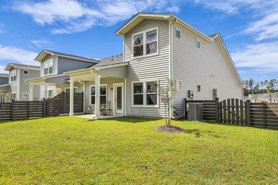 Exterior details and patio area of a home in Hammock Walk at Nexton, Summerville (Image 3). Exterior details and patio area of a home in Hammock Walk at Nexton, Summerville (Image 3).