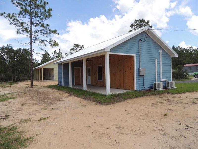 Exterior details and patio area of a home in , Williston (Image 4).