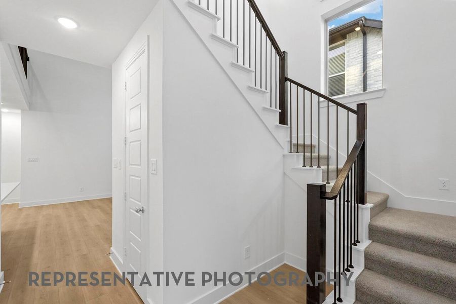 A beautiful entryway welcomes you with elegant detailing and graceful balusters that add a touch of sophistication.