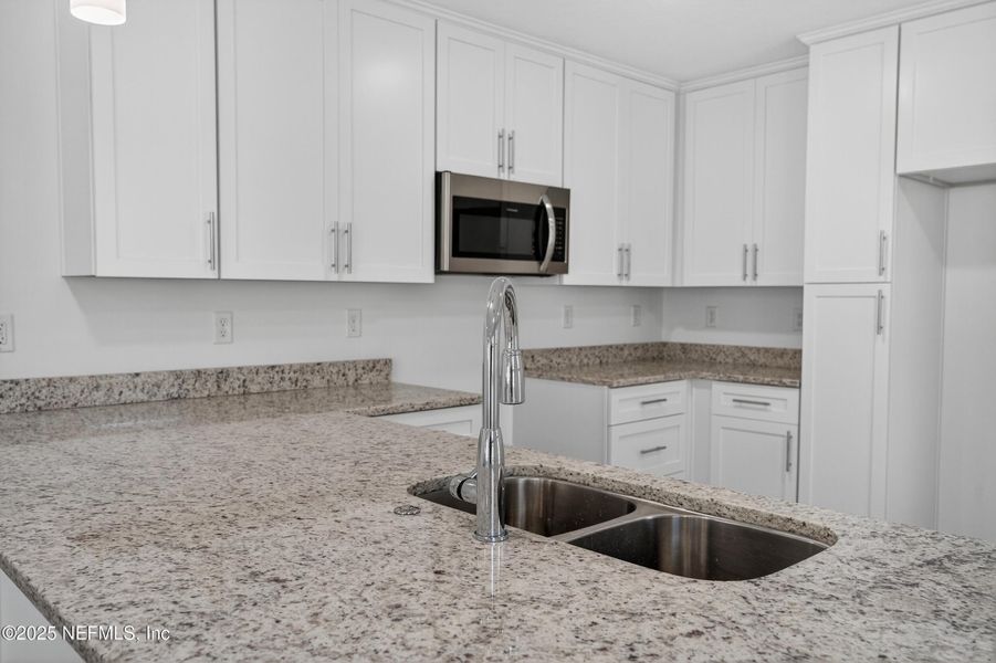 Furnished interior view inside a new home in , Jacksonville (Image 8). Furnished interior view inside a new home in , Jacksonville (Image 8).