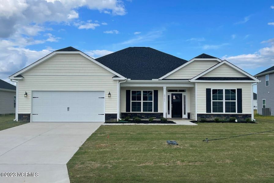 Front exterior of a new home in Summer Place, Grimesland, NC, highlighting curb appeal (Image 1). Front exterior of a new home in Summer Place, Grimesland, NC, highlighting curb appeal (Image 1).