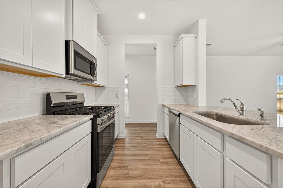 Furnished interior view inside a new home in Mill Creek Trails, Magnolia (Image 13).