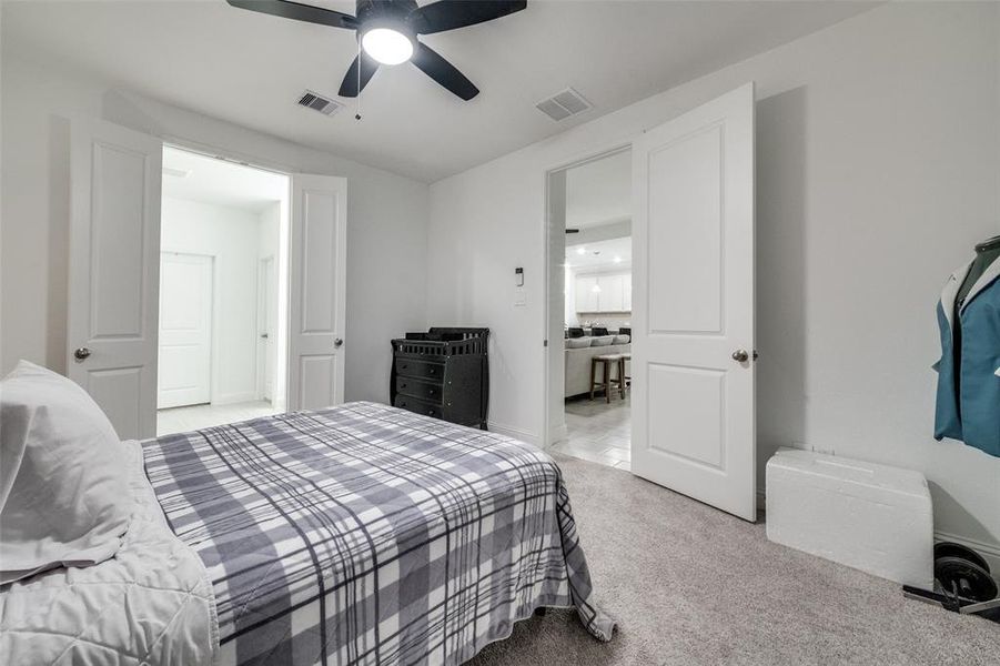 PRIMARY BEDROOM FEATURING 8' DOORS AND HIGH CEILINGS