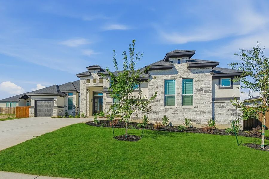 Representative exterior photo of a completed home built from the Anthony by Chesmar Homes in Mesa Western, Cibolo, TX (Image 17). Representative exterior photo of a completed home built from the Anthony by Chesmar Homes in Mesa Western, Cibolo, TX (Image 17).