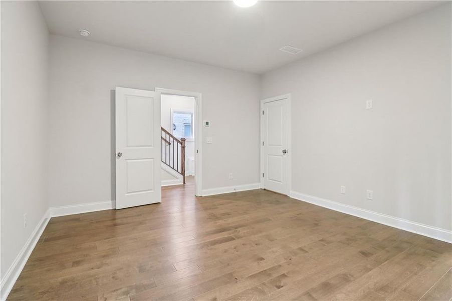 Spacious, unfurnished interior of a new home in Brackley Single Family, Cumming (Image 50). Spacious, unfurnished interior of a new home in Brackley Single Family, Cumming (Image 50).