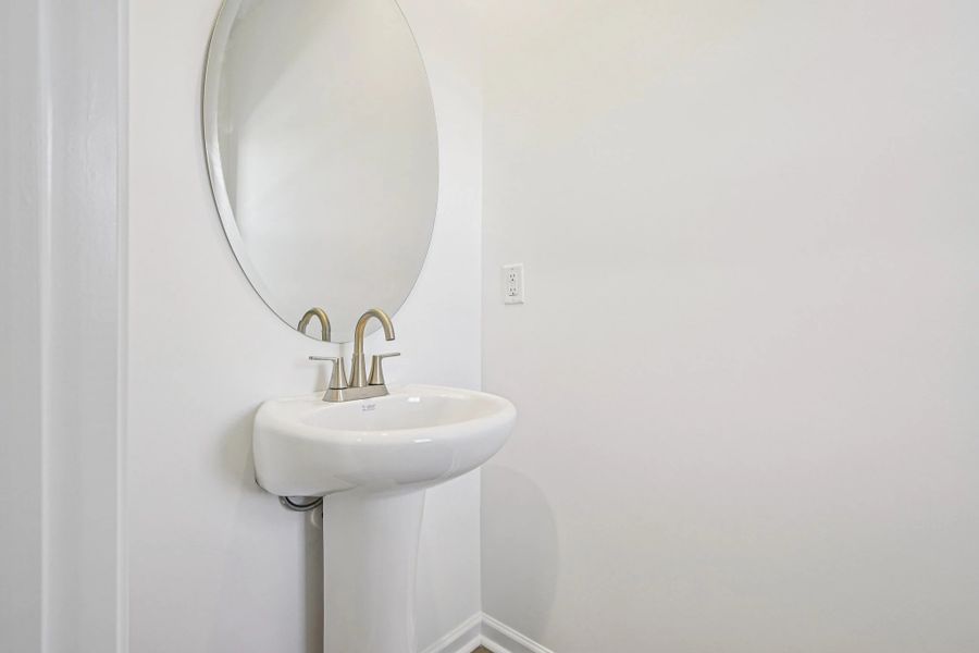 1/2 Bath featuring the AW Collection® Timeless - Petite space with tailored, elegant detail.