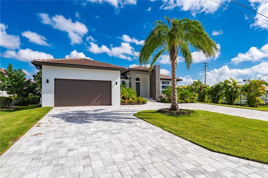Front exterior of a new home in , Punta Gorda, FL, highlighting curb appeal (Image 24).