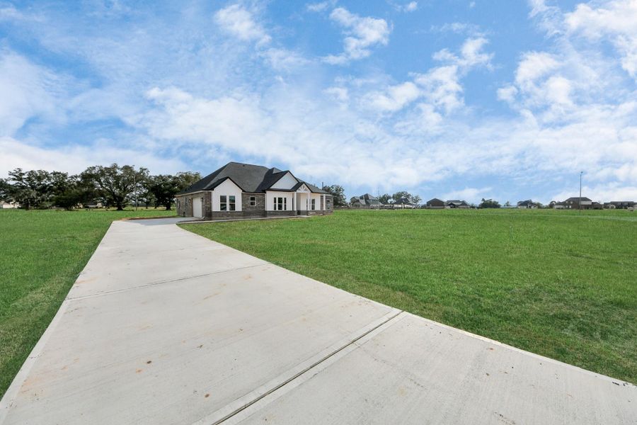 Exterior details and patio area of a home in , Rosharon (Image 7). Exterior details and patio area of a home in , Rosharon (Image 7).
