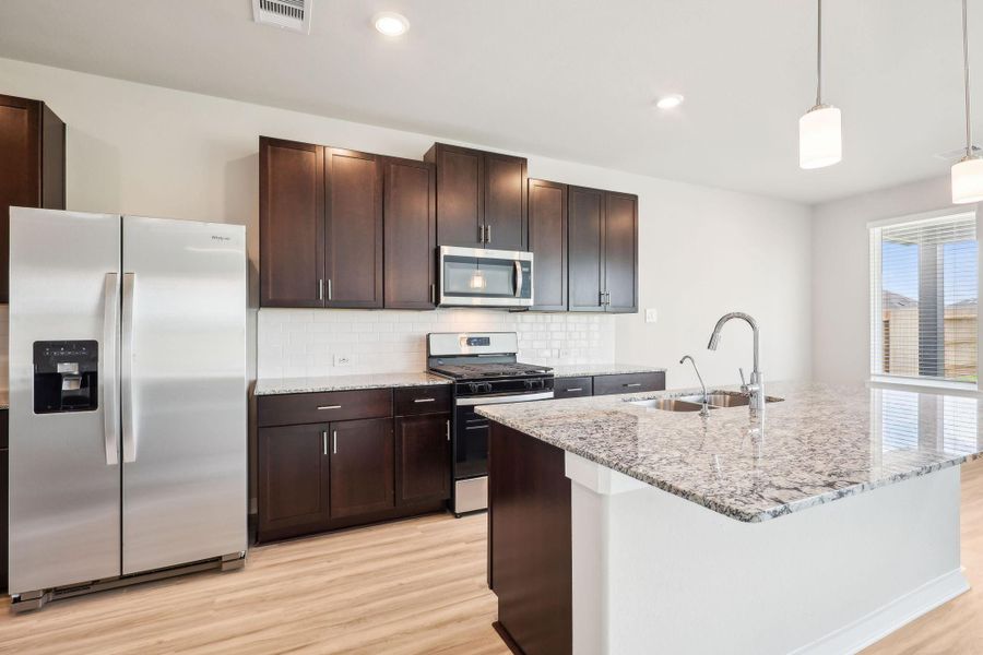 Photo is not of the actual home, but is an inspirational photo of builder’s model home and may depict options, furnishings, and/or decorator features that are not included