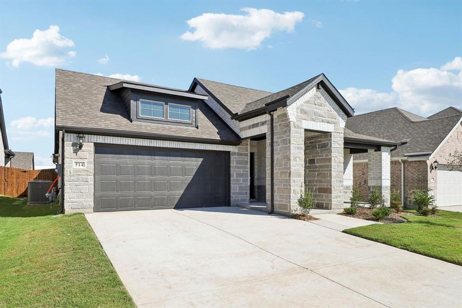 Front exterior of a new home in Southridge - Signature Series, McKinney, TX, highlighting curb appeal (Image 2). Front exterior of a new home in Southridge - Signature Series, McKinney, TX, highlighting curb appeal (Image 2).