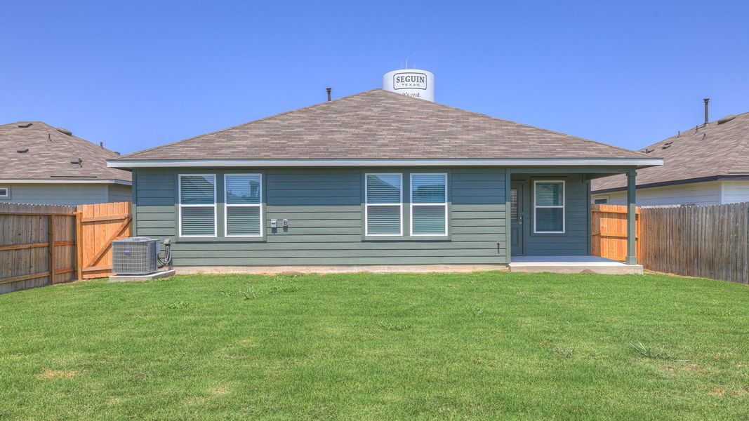 Front exterior of a new home in Navarro Fields, Seguin, TX, highlighting curb appeal (Image 19). Front exterior of a new home in Navarro Fields, Seguin, TX, highlighting curb appeal (Image 19).