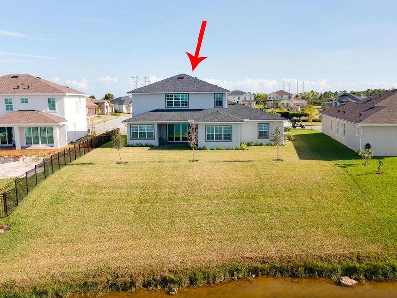 Front exterior of a new home in , The Acreage, FL, highlighting curb appeal (Image 24). Front exterior of a new home in , The Acreage, FL, highlighting curb appeal (Image 24).