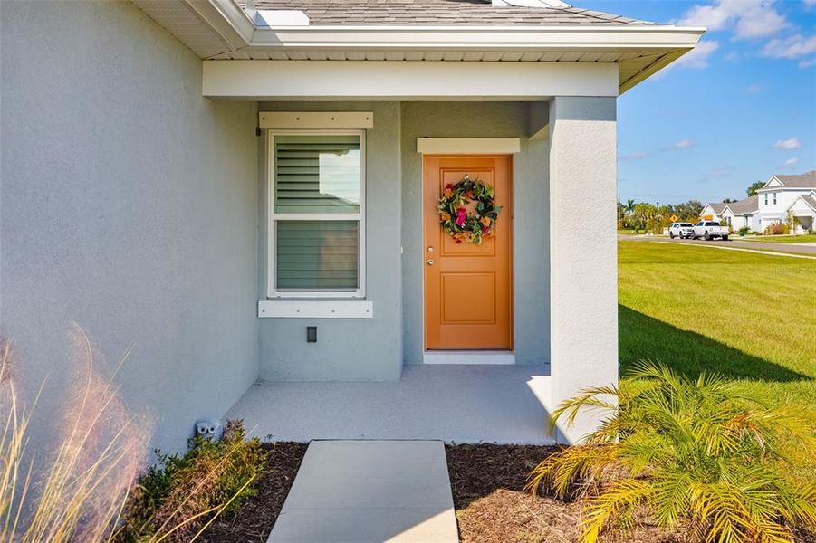 Exterior details and patio area of a home in Broadleaf, Parrish (Image 4).