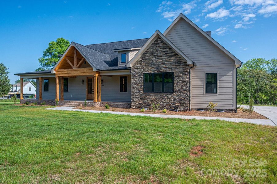 Front exterior of a new home in , Maiden, NC, highlighting curb appeal (Image 1).
