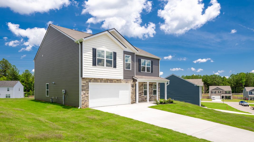 Front exterior of a new home in Byrd Farms, Dayton, TN, highlighting curb appeal (Image 19). Front exterior of a new home in Byrd Farms, Dayton, TN, highlighting curb appeal (Image 19).