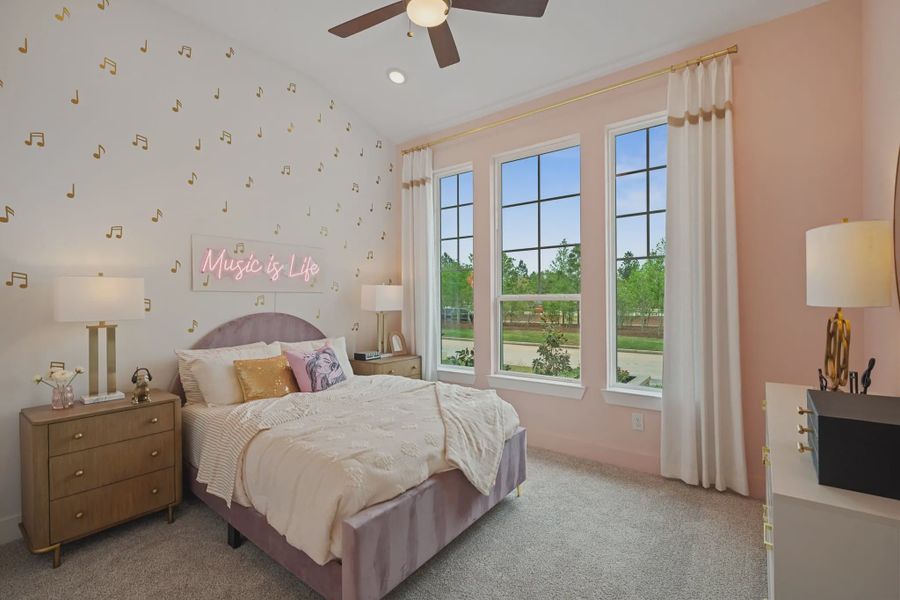Representative furnished interior of a home built from the Hampton by Chesmar Homes in Lakes of Cane Island, Katy (Image 12).