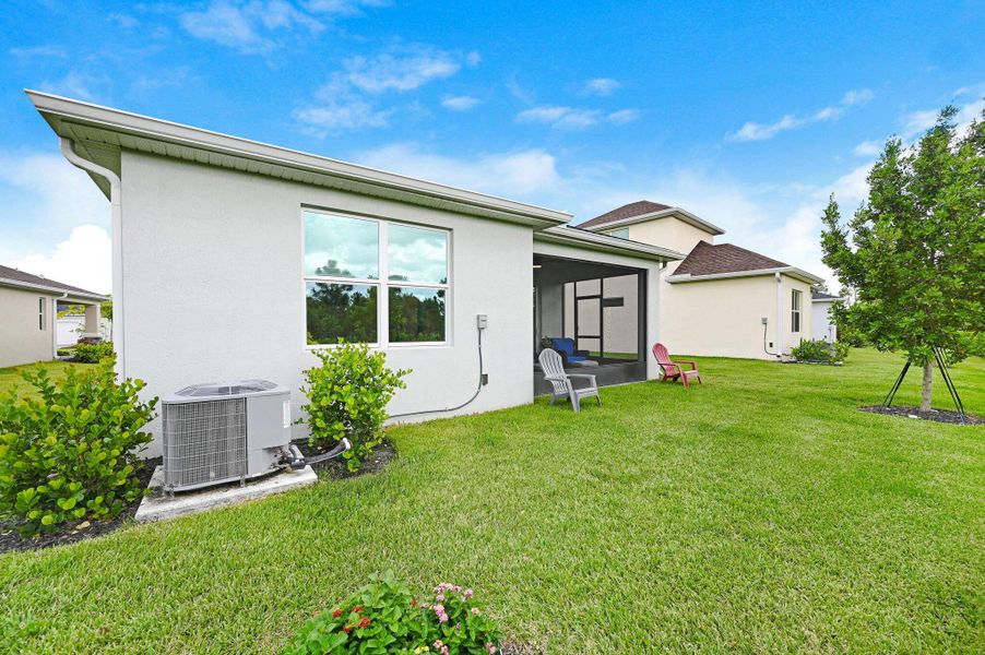 Front exterior of a new home in , Melbourne, FL, highlighting curb appeal (Image 23). Front exterior of a new home in , Melbourne, FL, highlighting curb appeal (Image 23).