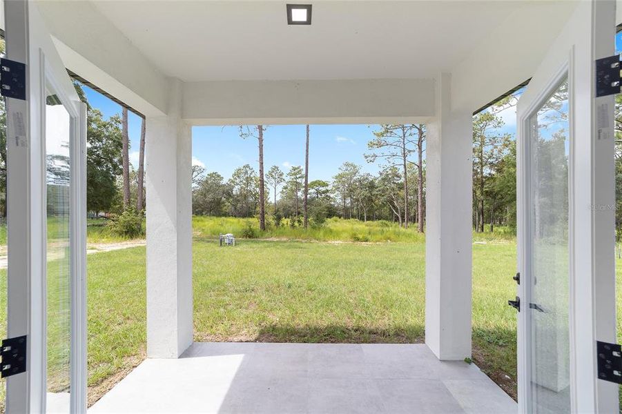 Exterior details and patio area of a home in , Ocala (Image 24).