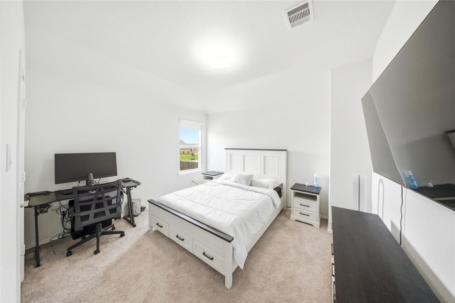 Furnished interior view inside a new home in Sierra Vista, Iowa Colony (Image 31).