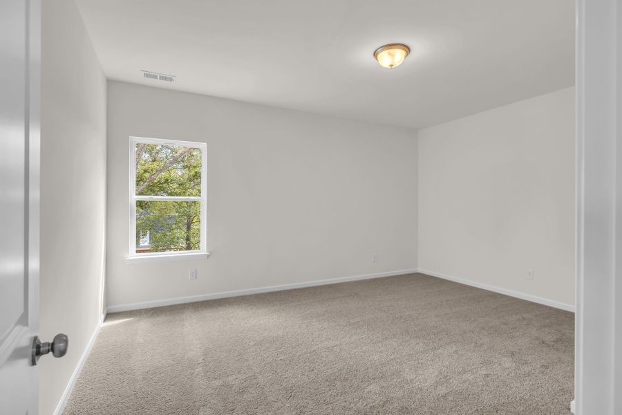 Large upstairs bedroom. Large upstairs bedroom.