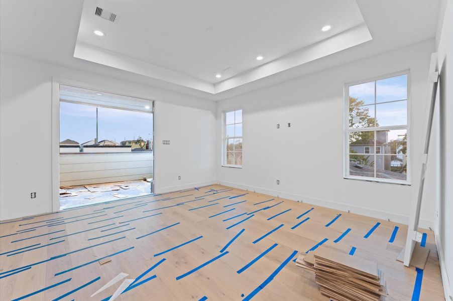 Top floor game room opens to the covered rooftop deck. Top floor game room opens to the covered rooftop deck.