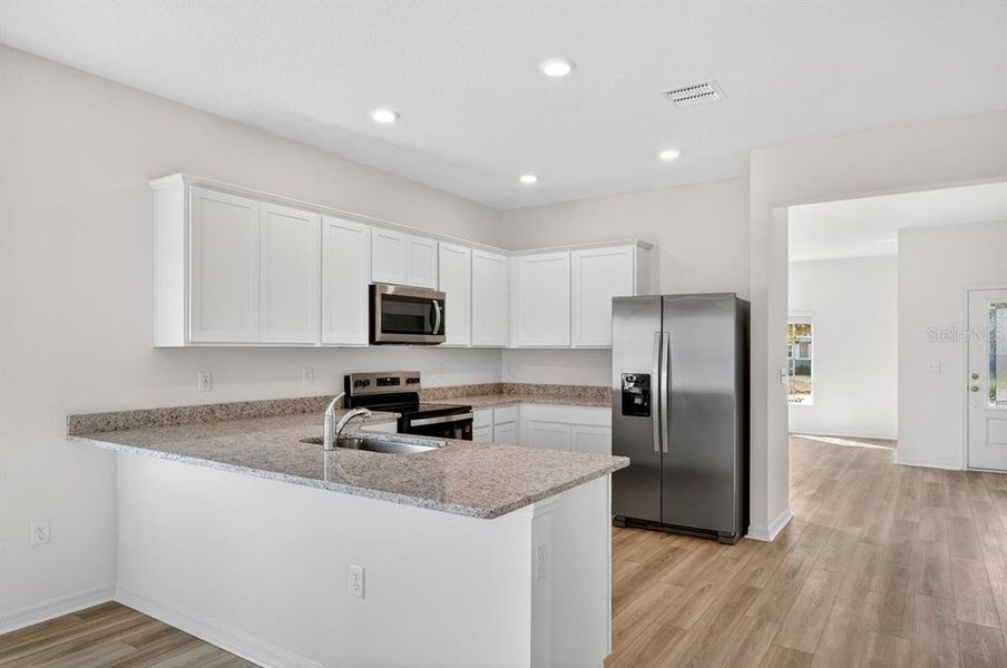 Furnished interior view inside a new home in , Deltona (Image 7).