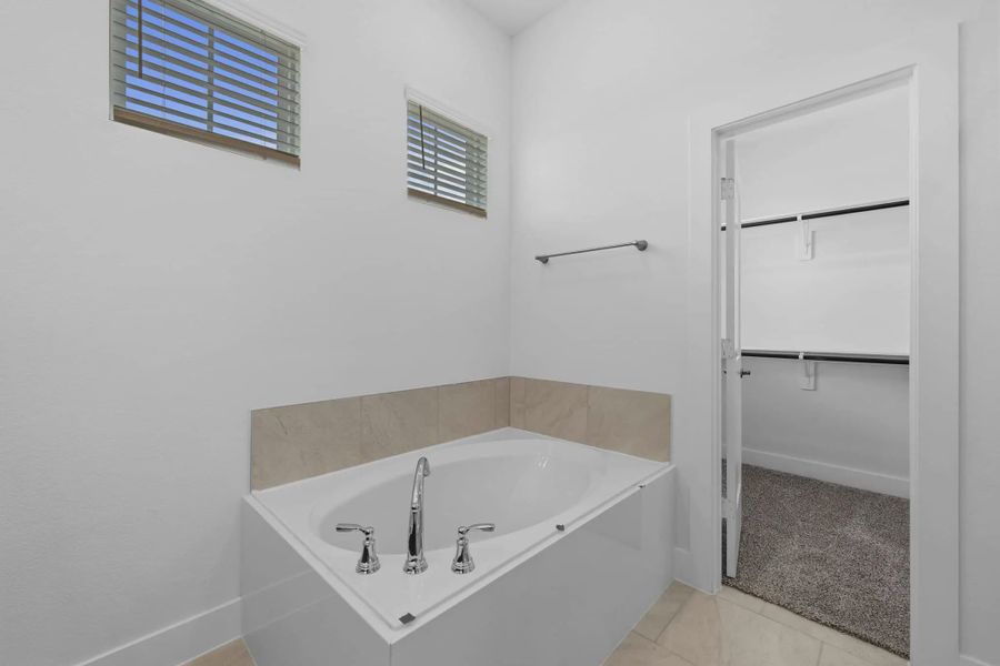 Image 44 representing the Cheverny by Chesmar Homes in Bridgeland Chateau, Cypress, TX.
