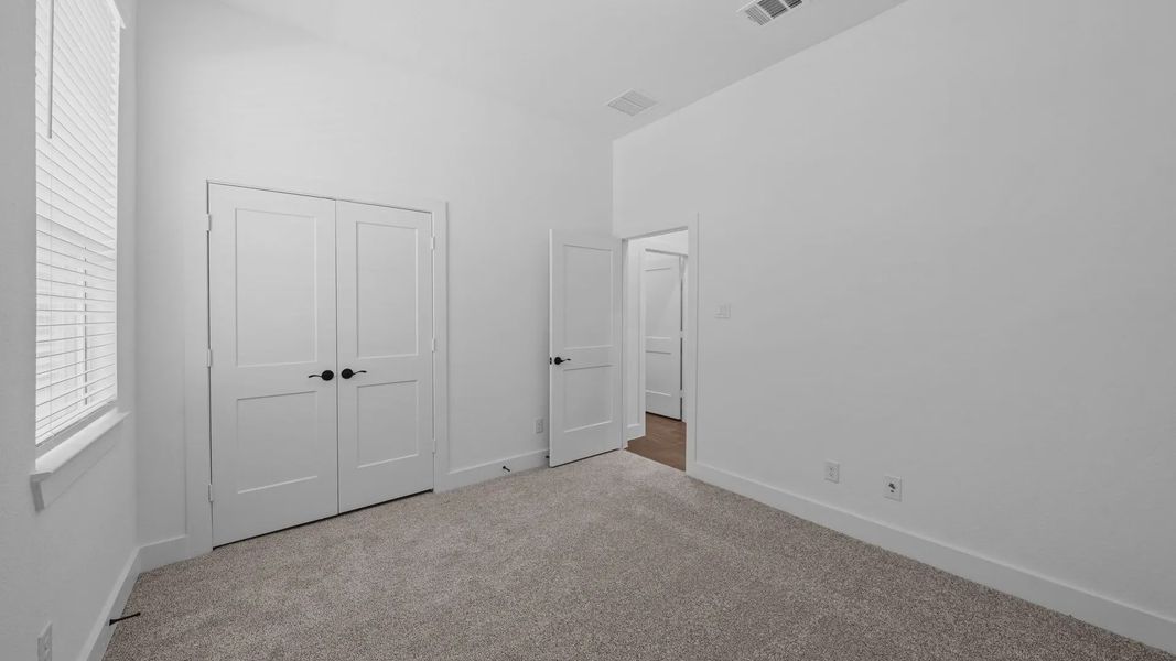 Spacious, unfurnished interior of a new home in Attwater 55s, Waller (Image 24).