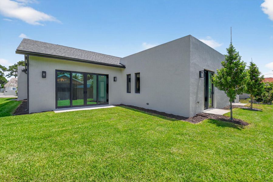 Front exterior of a new home in , Palm Springs, FL, highlighting curb appeal (Image 32).