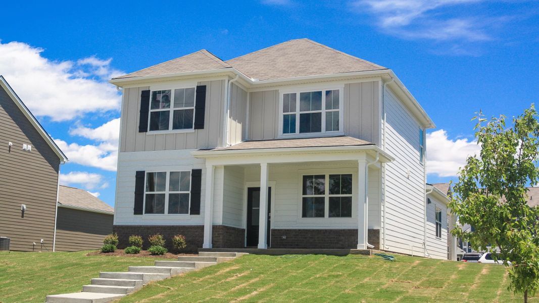 Front exterior of a new home in Reserve at Hickory Ridge, Columbia, TN, highlighting curb appeal (Image 19).