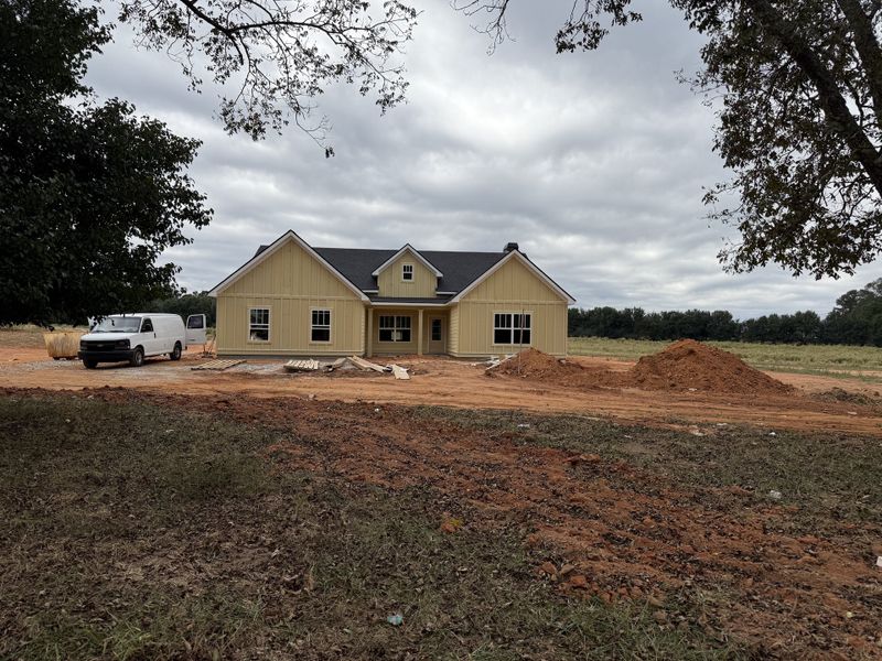 Exterior details and patio area of a home in Rover Roc Farms, Williamson (Image 1).