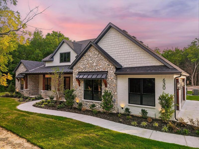 Front exterior of a new home in , Waxahachie, TX, highlighting curb appeal (Image 2).