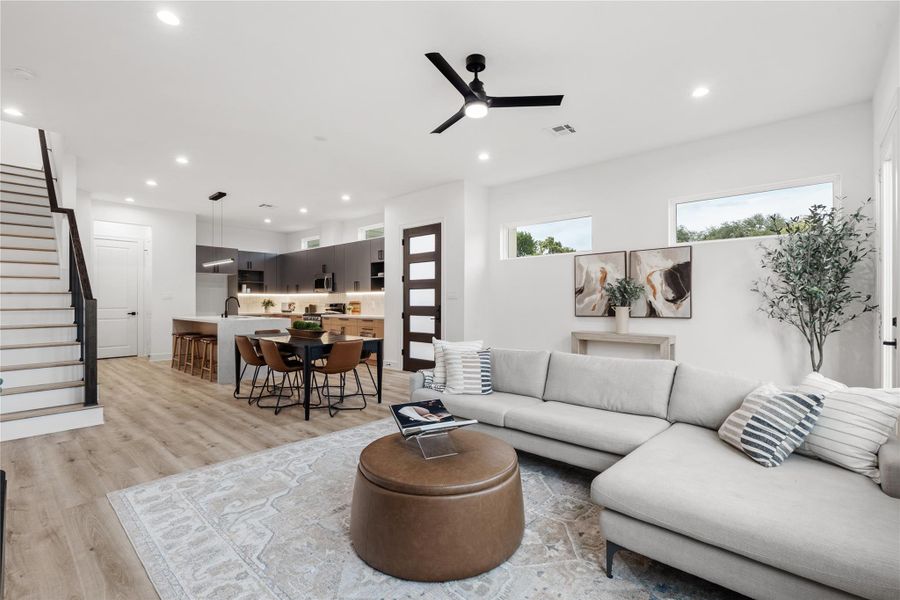 A perfect illustration of modernliving — cooking, dining, andlounging converge effortlessly inthis free-flowing open plan.