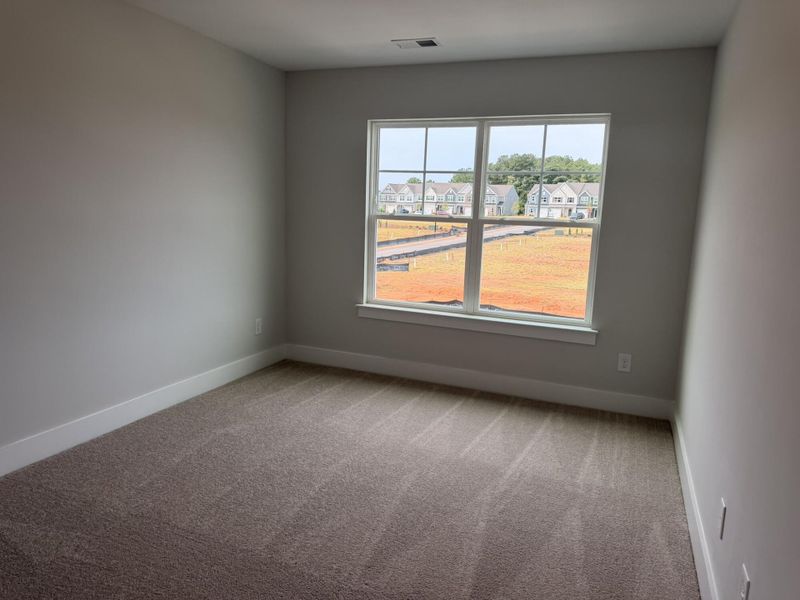 Spacious, unfurnished interior of a new home in Blythe Mill Townhomes, Waxhaw (Image 15).