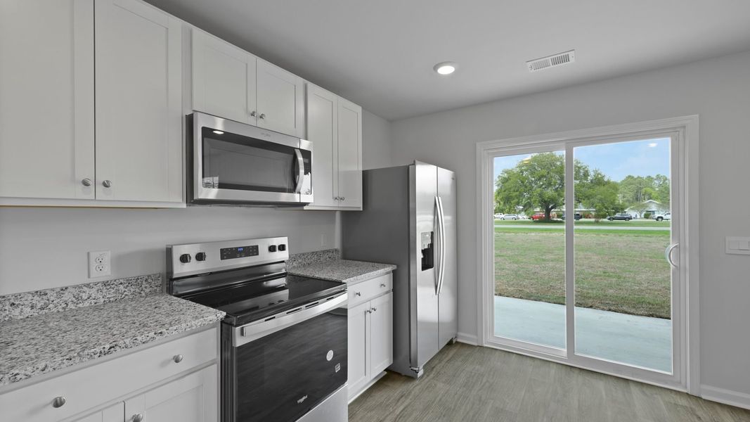 Representative furnished interior of a home built from the BRANDON by D.R. Horton in Evergreen, Holly Hill (Image 7).
