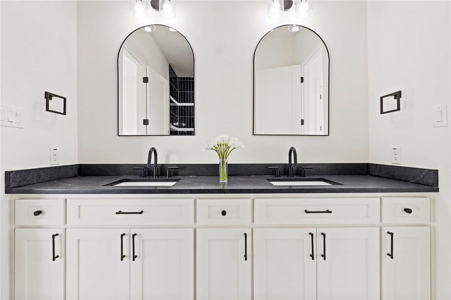 Bathroom featuring double vanity Bathroom featuring double vanity