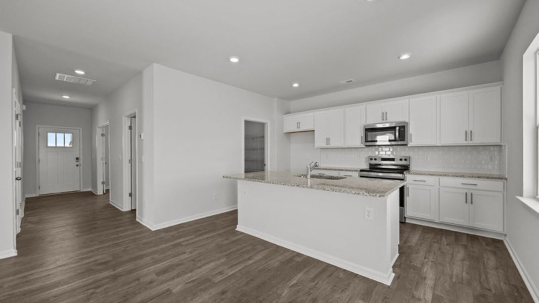 Furnished interior view inside a new home in East Ridge, Ayden (Image 4).
