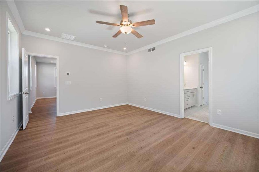 Spacious, unfurnished interior of a new home in The Paddocks at Doc Hughes, Buford (Image 24).