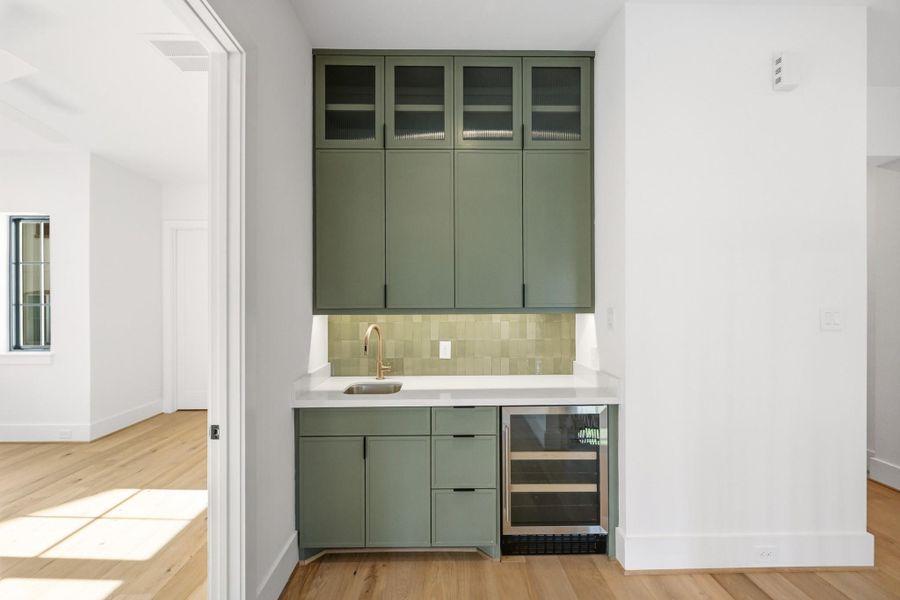 A second wet-bar serves the game room and upstairs!