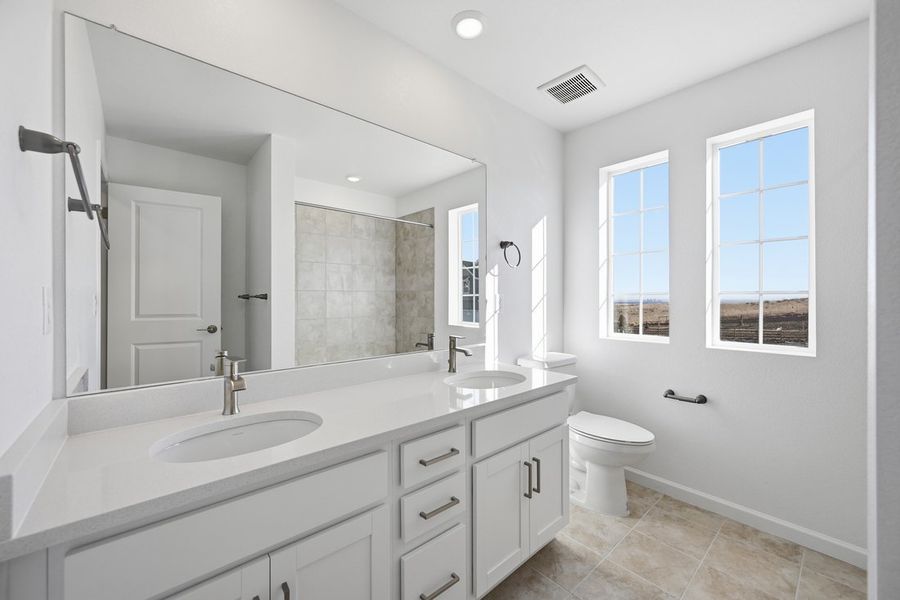 Furnished interior view inside a new home in Trailstone, Arvada (Image 8).