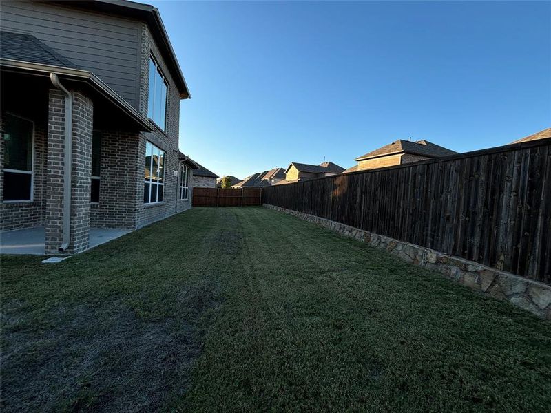 View of yard with a patio area