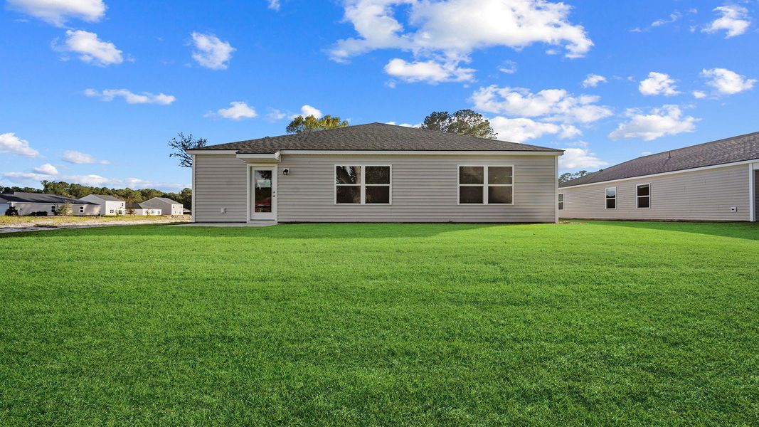 Exterior details and patio area of a home in Longleaf Village, Rincon (Image 2).