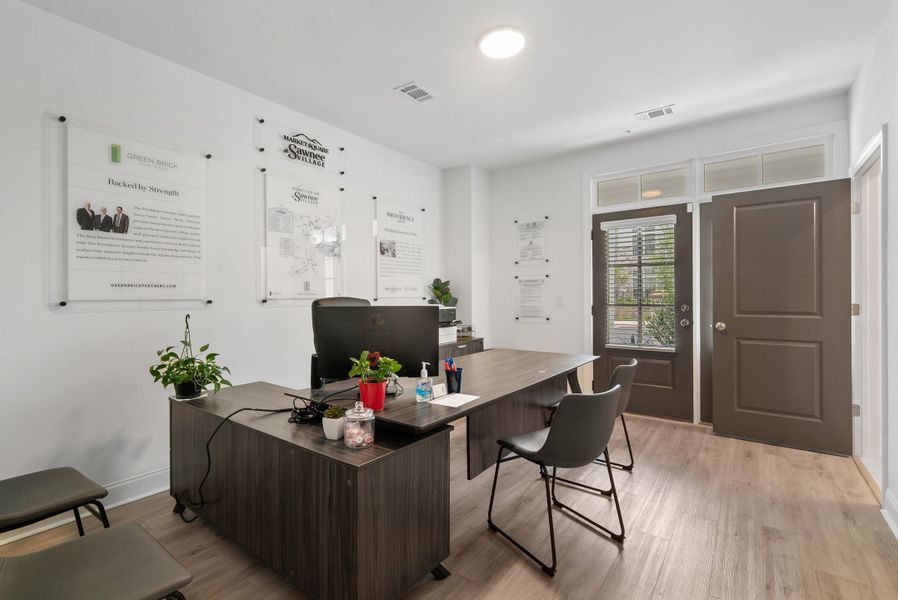 Representative furnished interior of a home built from the The Oleander by The Providence Group in Market Square at Sawnee Village, Cumming (Image 10).