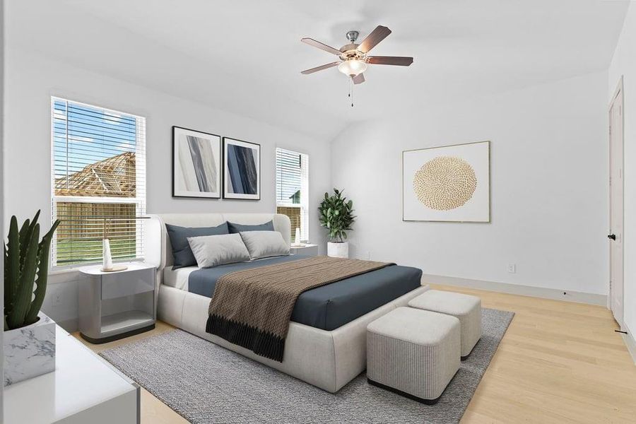A spacious primary bedroom emphasizing open space and natural lighting with large windows. A spacious primary bedroom emphasizing open space and natural lighting with large windows.
