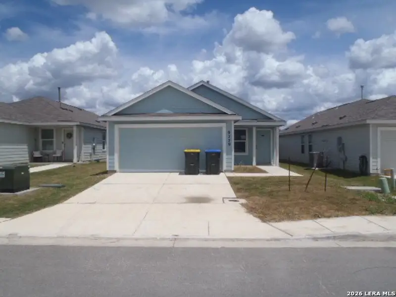 Front exterior of a new home in Navarro Ranch, Seguin, TX, highlighting curb appeal (Image 2). Front exterior of a new home in Navarro Ranch, Seguin, TX, highlighting curb appeal (Image 2).