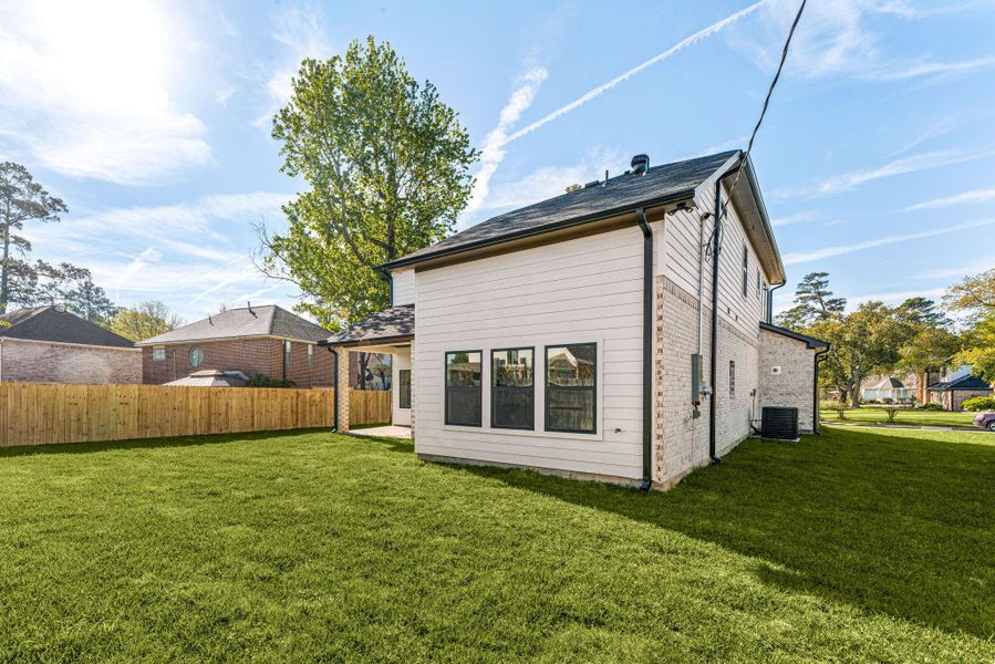Exterior details and patio area of a home in , Tomball (Image 27).