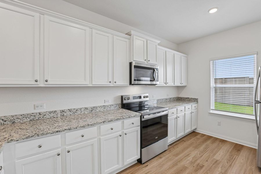 Furnished interior view inside a new home in , Elgin (Image 6).