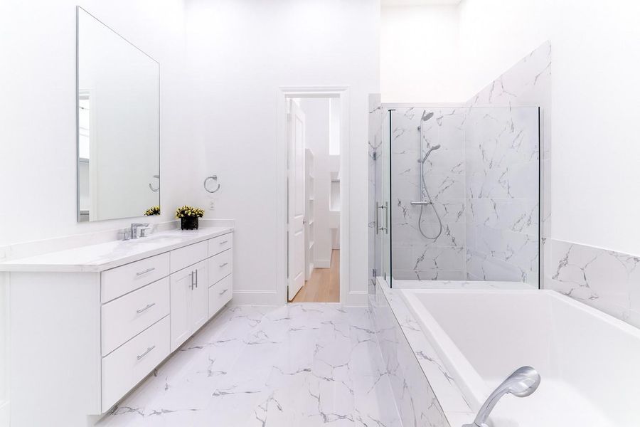 Similar home/ floor plan. Contrasting cabinets and finishes in actual home.