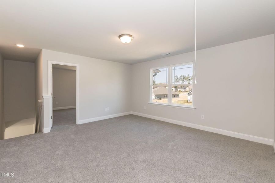 Representative unfurnished interior of a home built from the 2721 by Adams Homes in Hidden Pines, Cameron (Image 24).