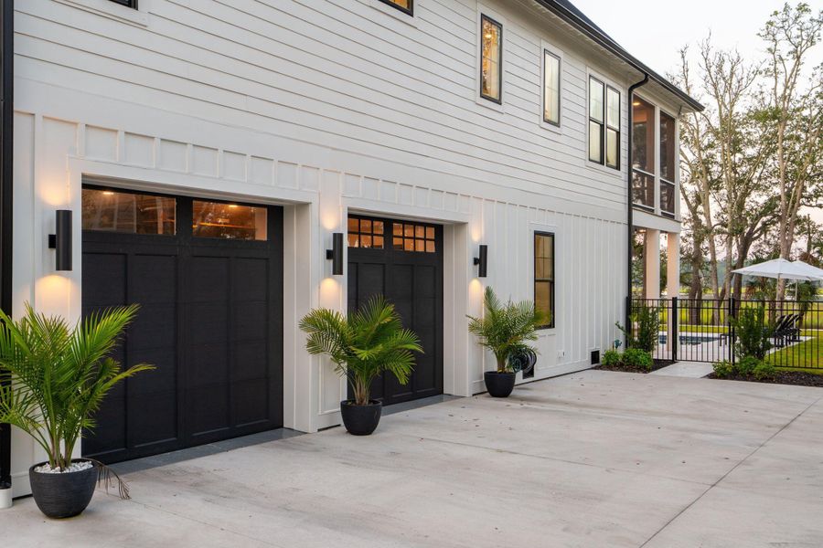 Front exterior of a new home in , Awendaw, SC, highlighting curb appeal (Image 20). Front exterior of a new home in , Awendaw, SC, highlighting curb appeal (Image 20).